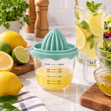Exprimidor Manual de Cítricos con Jarra Medidora 250 ml - Multimenaje